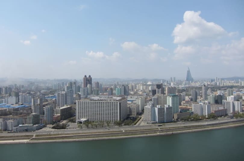 город